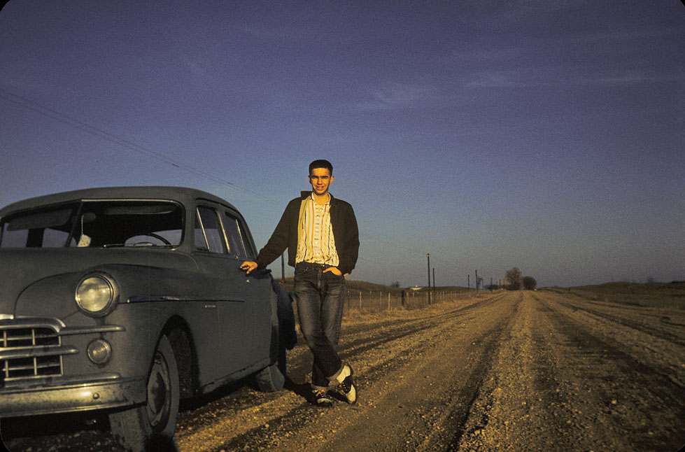#49 Boy poses with his 1949 Dodge in Peoria, Illinois, 1957