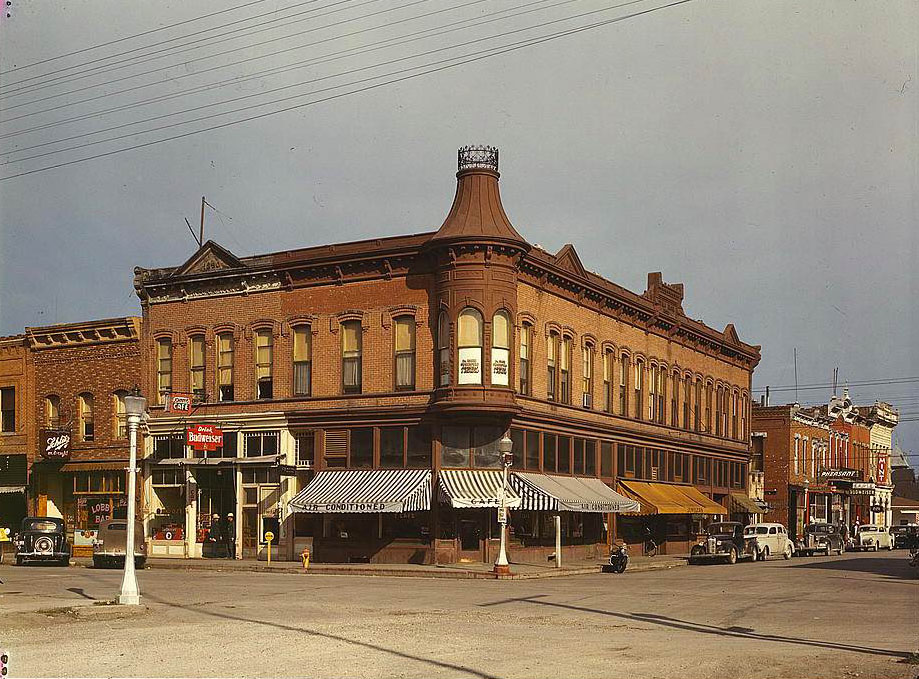 #66 Street corner, Dillon, Mont. Dillon is the trading center for a prosperous cattle and sheep country, 1950s