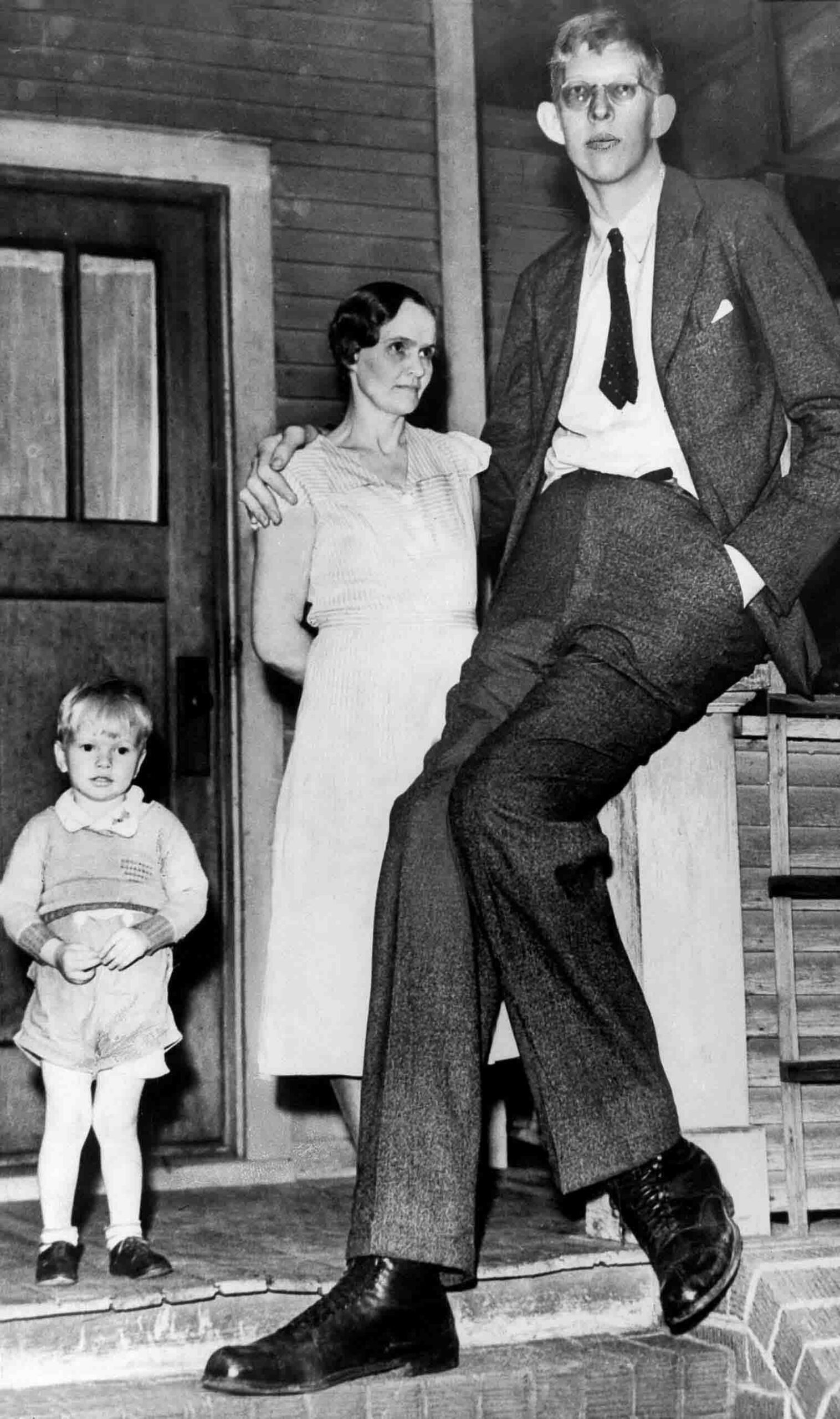 #1 Wadlow with his mother and brother, 1935.