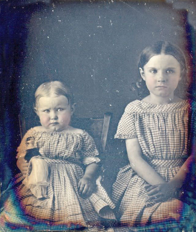 #34 Sisters with doll