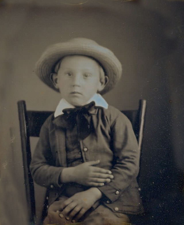 #6 A little boy in a straw hat