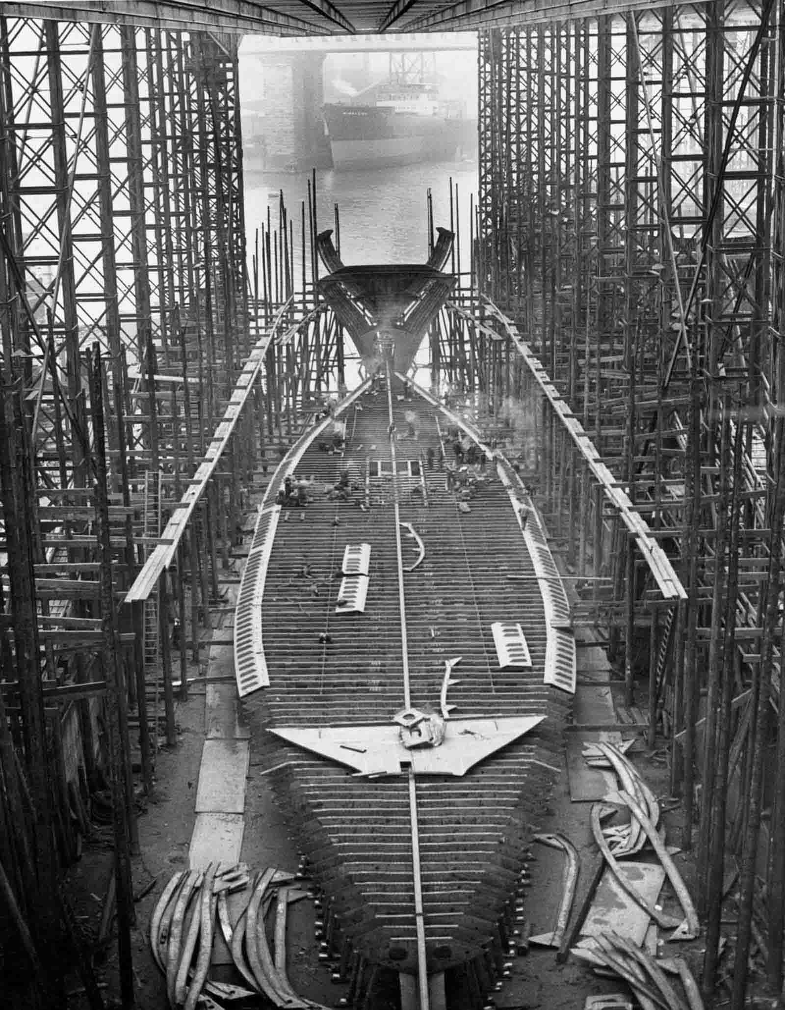 #12 A ship under construction in London, 1900.