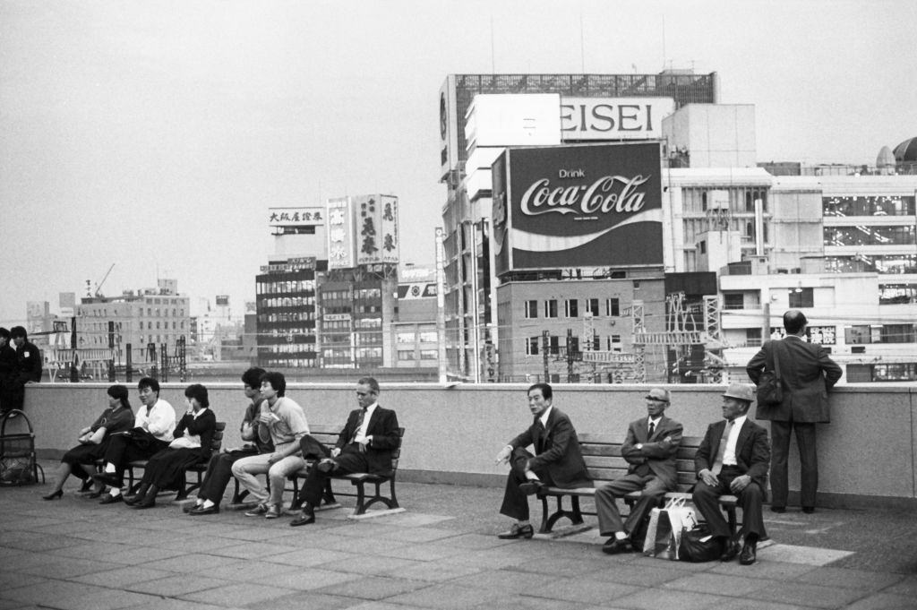 #77 Travelers waiting for the train at Ueno station in Tokyo, 1984