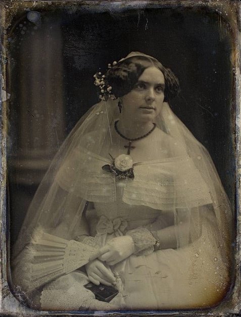 #6 An Victorian bride looking radiantly lovely in her elegant, feminine white dress, ca. 1850s