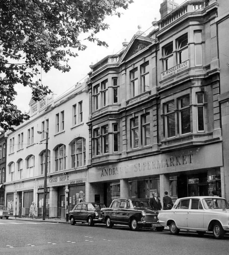 #117 The unoccupied buildings of Cross Bros Ltd, and Andrews Supermarket in Working Street, Cardiff, South Glamorgan, Wales, 2nd August 1966.