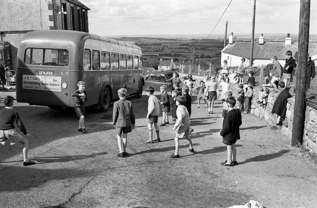 #54 General shots of the village Rhiwlas, in Bangor, Gwynedd, Wales. Children playing outdoors, 20th September 1964.