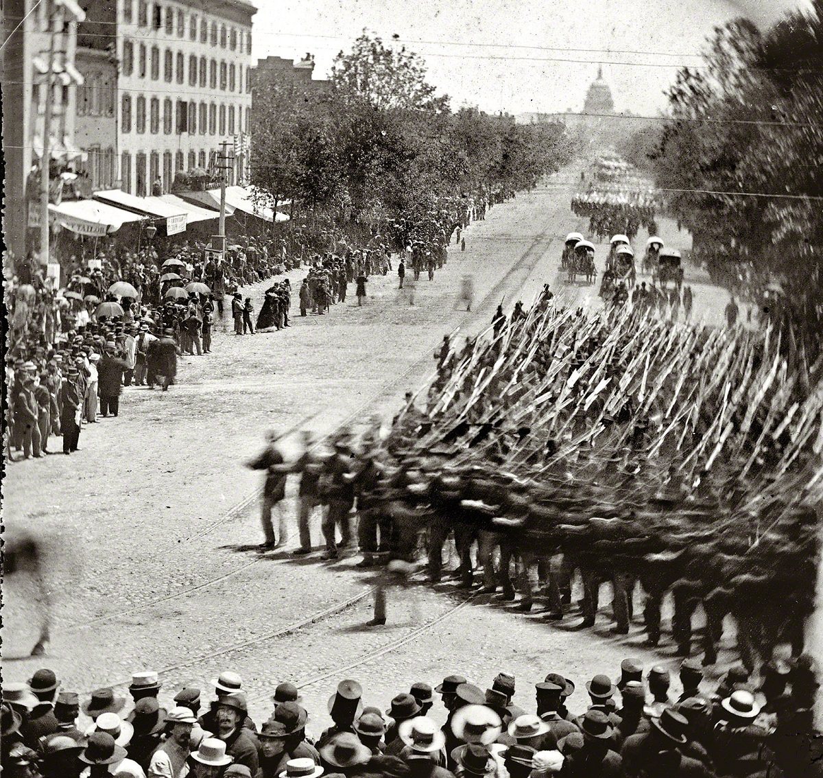 #10 Washington, District of Columbia. The Grand Review of the Army. Units of XX Army Corps, Army of Georgia, passing on Pennsylvania Avenue near the Treasury, Washington, D.C., 1865.
