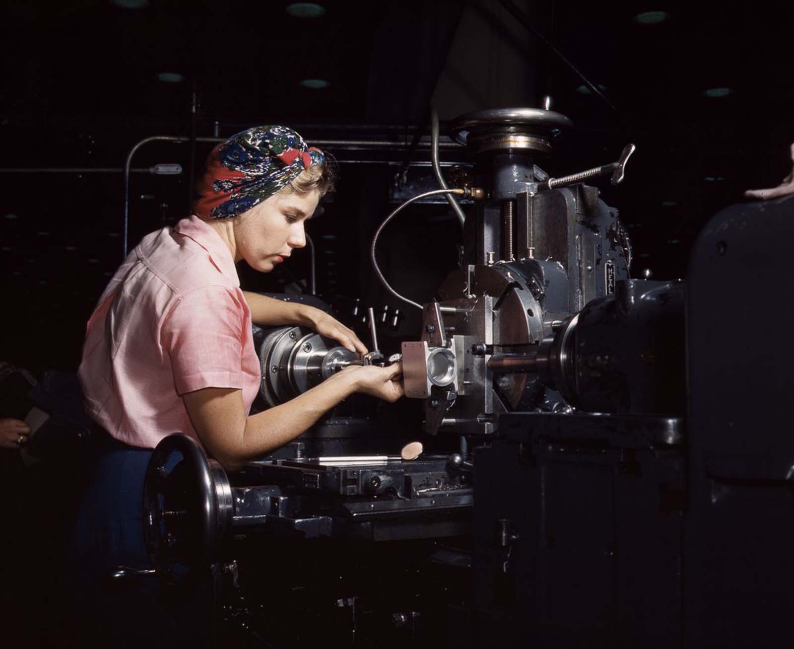 #15 A machinist at work at the Douglas Aircraft Company plant in Long Beach, California, 1942.