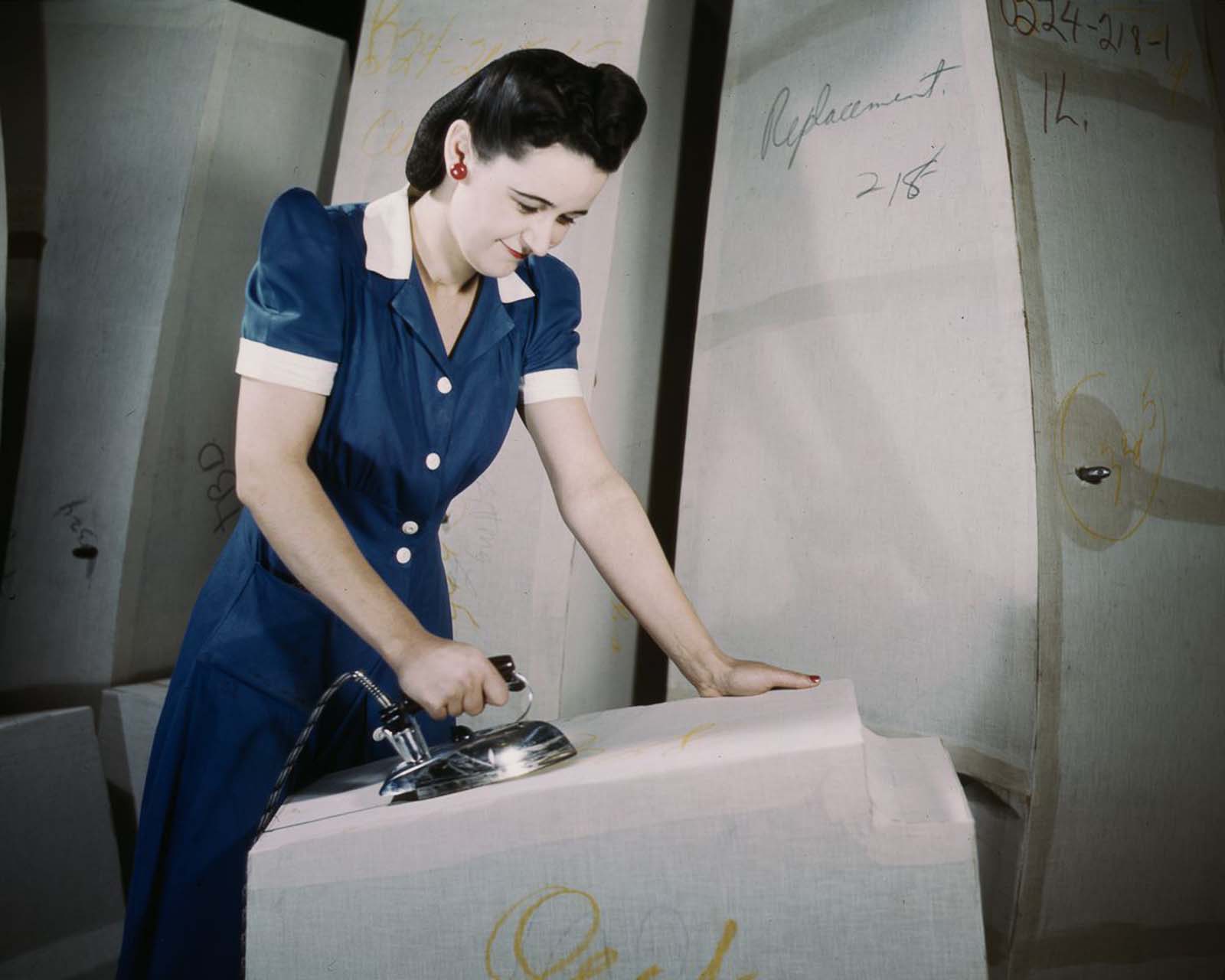 #5 A worker irons at a factory for self-sealing gas tanks owned by the Goodyear Tire and Rubber Co. in Akron, Ohio, 1941.