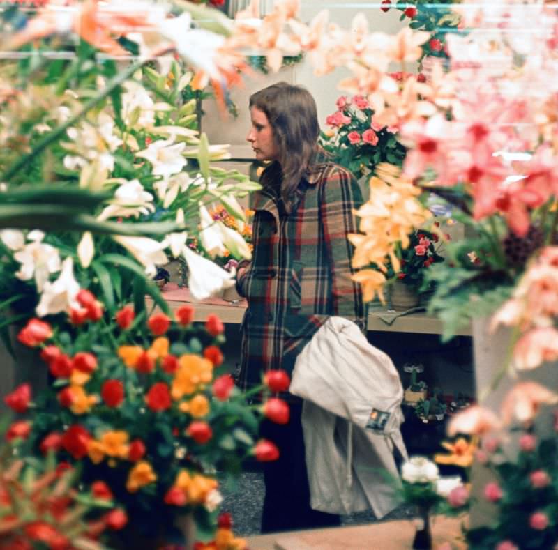 #15 Frankfurt. Girl in flower shop, Germany, 1972