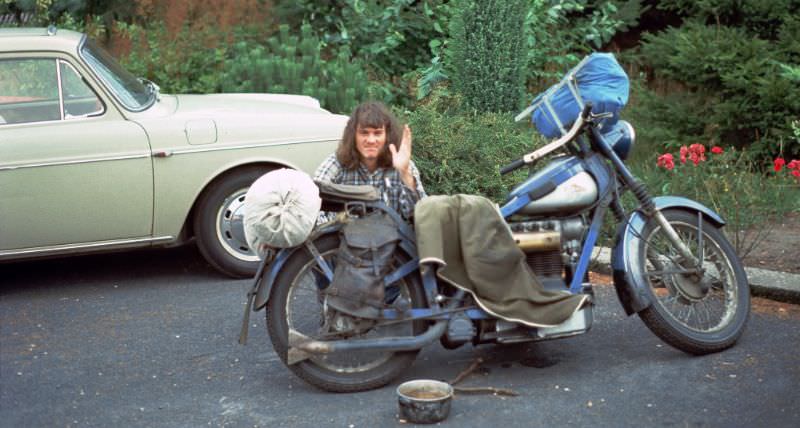 #35 Bremen. Dutchman checking his bike at Akademie, Germany, 1975