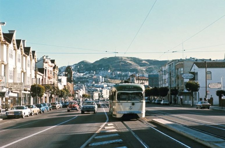 #11 PCC heading downtown on Market Street approaching Sanchez Street/15th Street, 1971