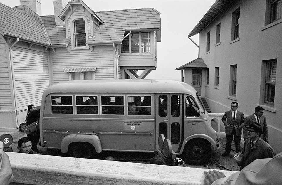 #18 Convict’s Bus – The convicts were driven by bus to the dock. In the background are the Doctor’s House (left) and the Warden’s House.