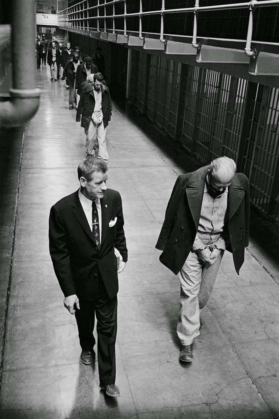 #4 Convicts on Broadway – Handcuffed, shackled and chained, convicts are marched out of United States Penitentiary Alcatraz.