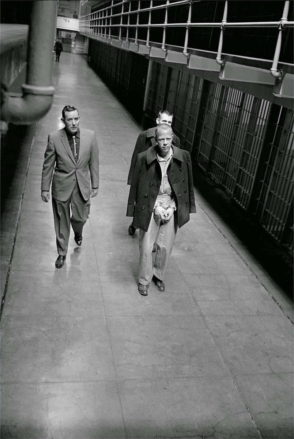 #6 Convicts on Broadway – Handcuffed, shackled and chained, convicts are marched out of United States Penitentiary Alcatraz.