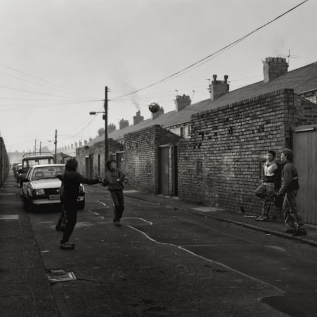 #16 Boys playing football on Beatrice Street, 1979