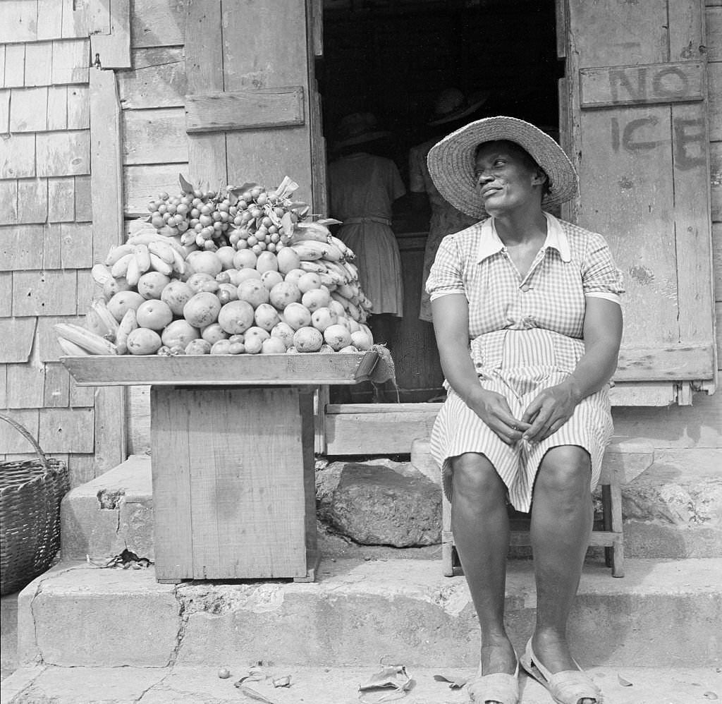 #57 A local women sells fruit in Bridgetown, 1946