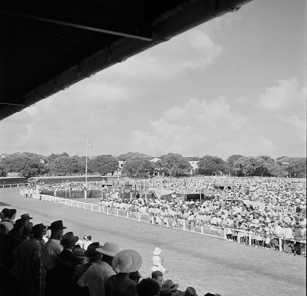 #58 People attend a local horse race in Bridgetown, 1946