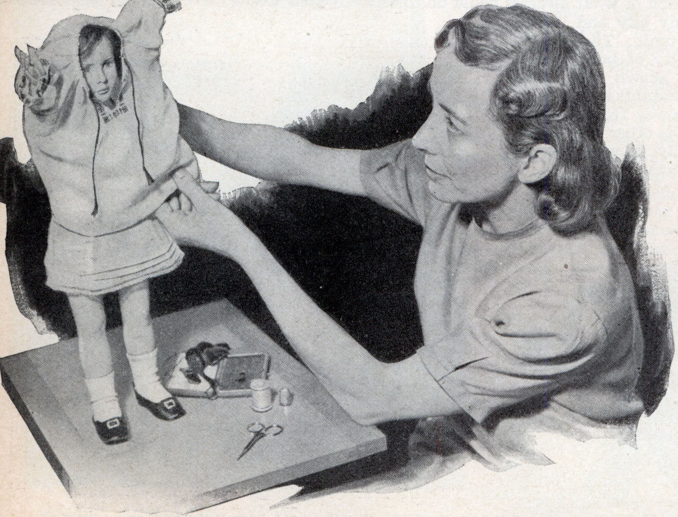 #3 Dressing the doll.