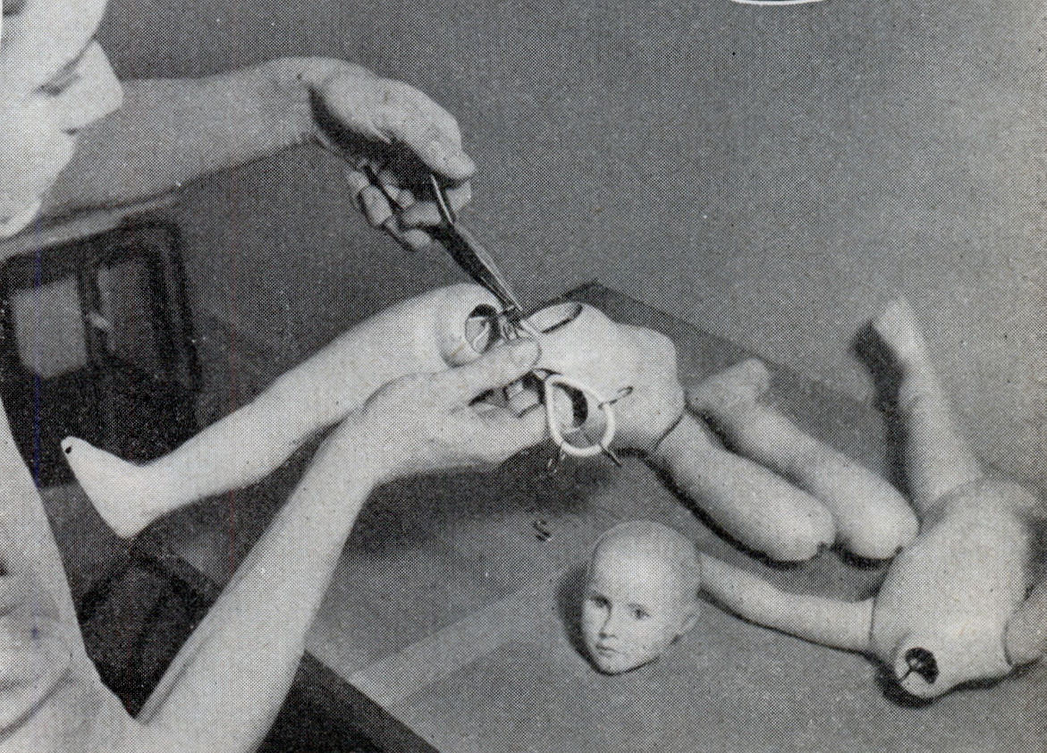 #7 The body is formed of unbreakable composition material and the hands of hard rubber.