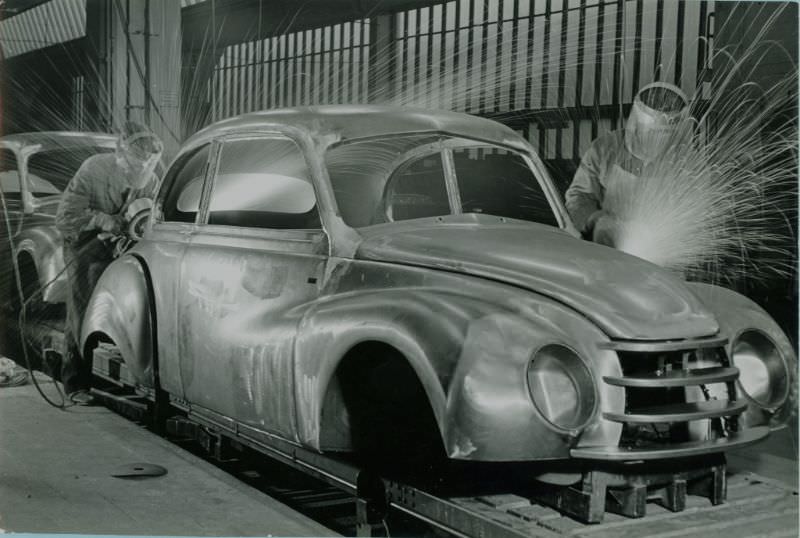 #18 Welding a car body, 1951