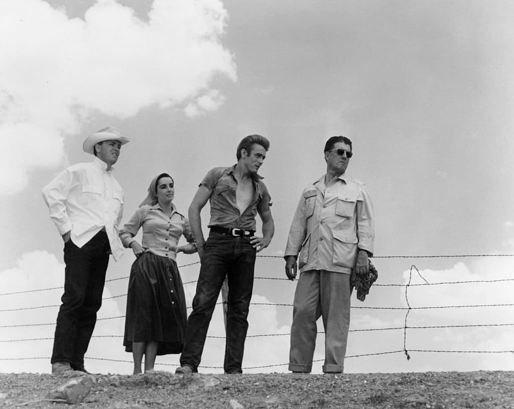 #21 Elizabeth Taylor, James Dean and director George Stevens on the set of the 1955 film Giant.