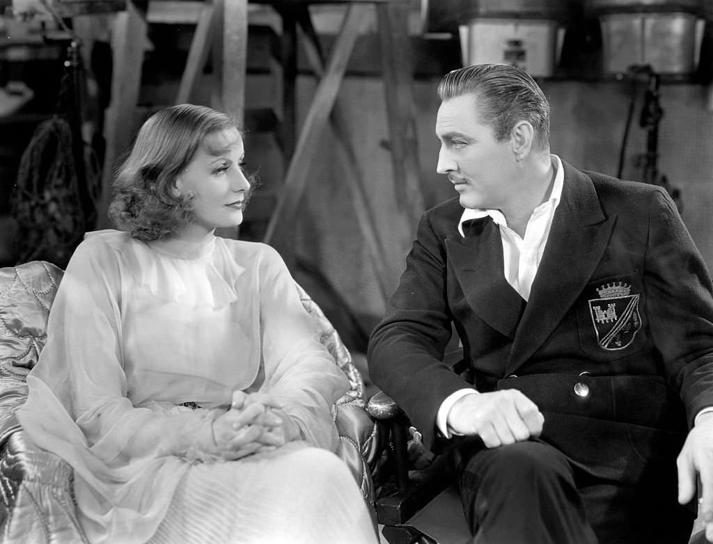 #23 Greta Garbo and John Barrymore on the set of “Grand Hotel”, 1932