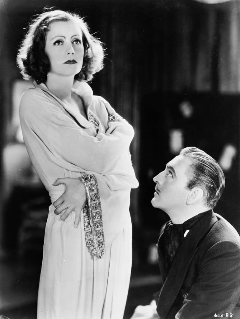 #36 John Barrymore contrives to seduce the eccentric Greta Garbo in a scene from ‘Grand Hotel’, 1932