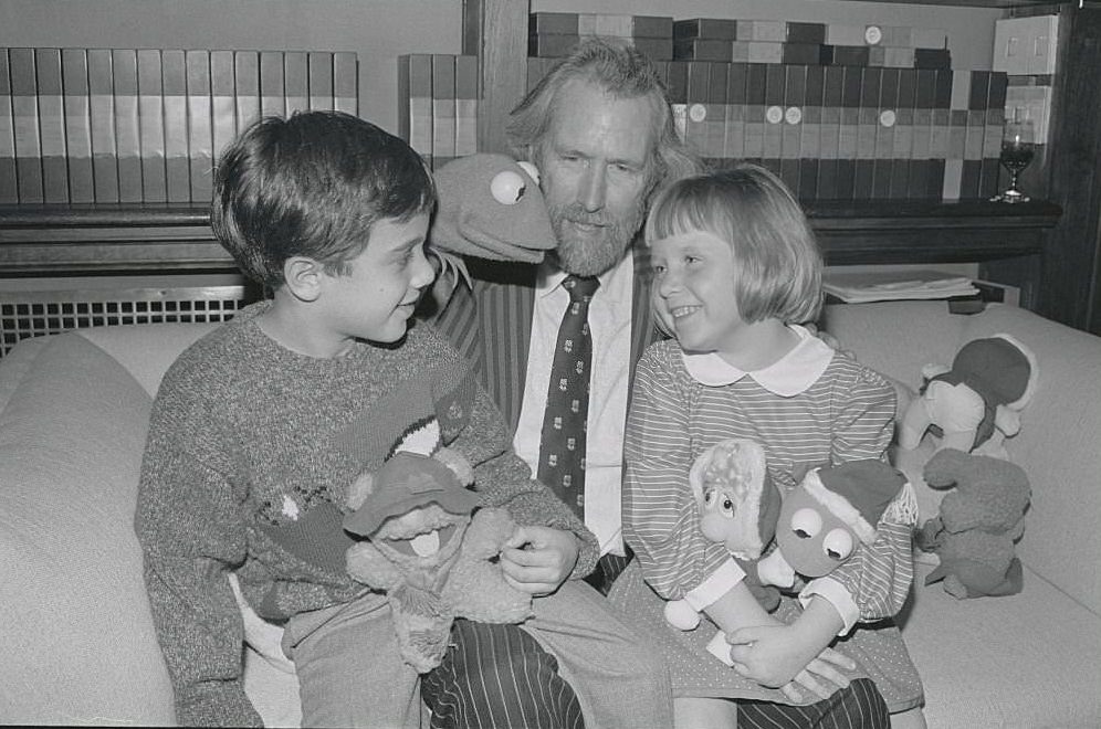 #1 Jim Henson and Kermit The Frog give some of the Muppet Baby Plush dolls to two youngsters during a press interview on October 18th.
