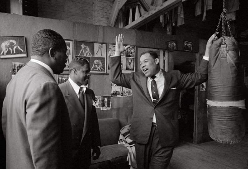 #13 Joe Louis at gym, 1954.