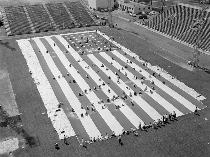 #15 Cleaning old glory, Detroit, 1955.