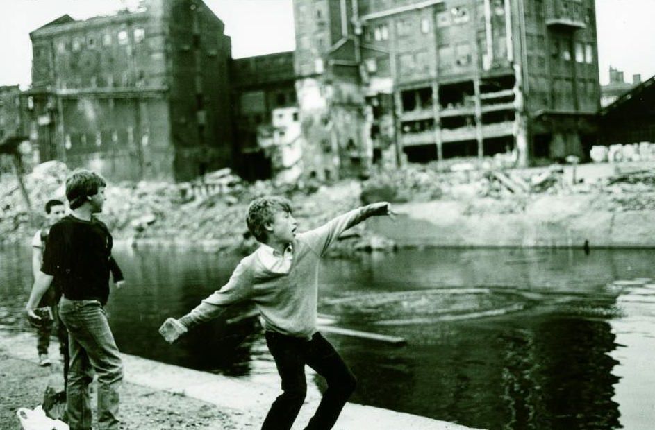 #120 Lad throwing rock into the Leeds–Liverpool Canal