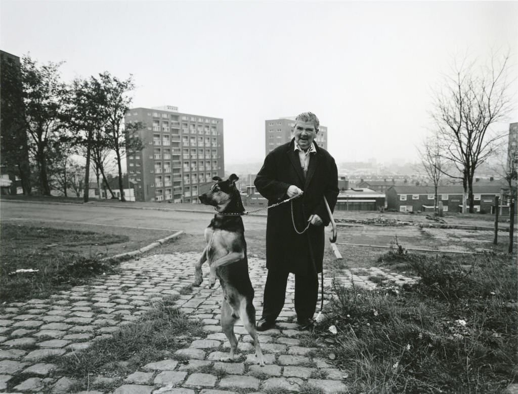 #3 A man taking his dog for a walk in Liverpool, 1982.