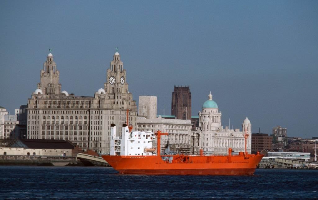 #28 A view of the Liverpool skyline across the River Mersey in Liverpool, June, 1985.