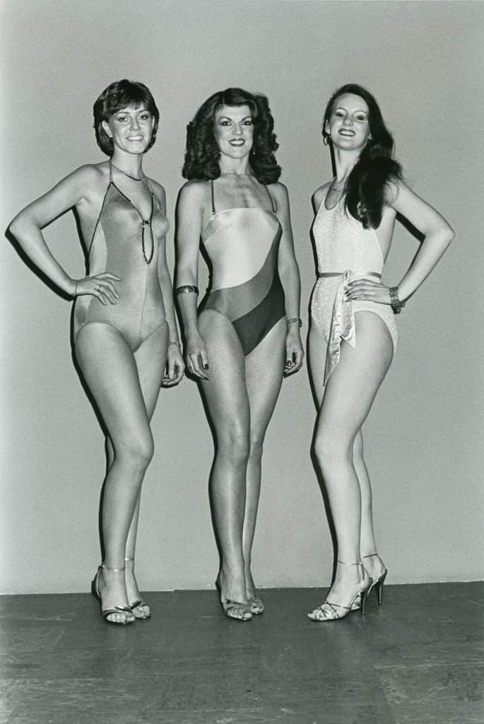 #148 Three contestants in beauty contest being staged in Liverpool, 1981.