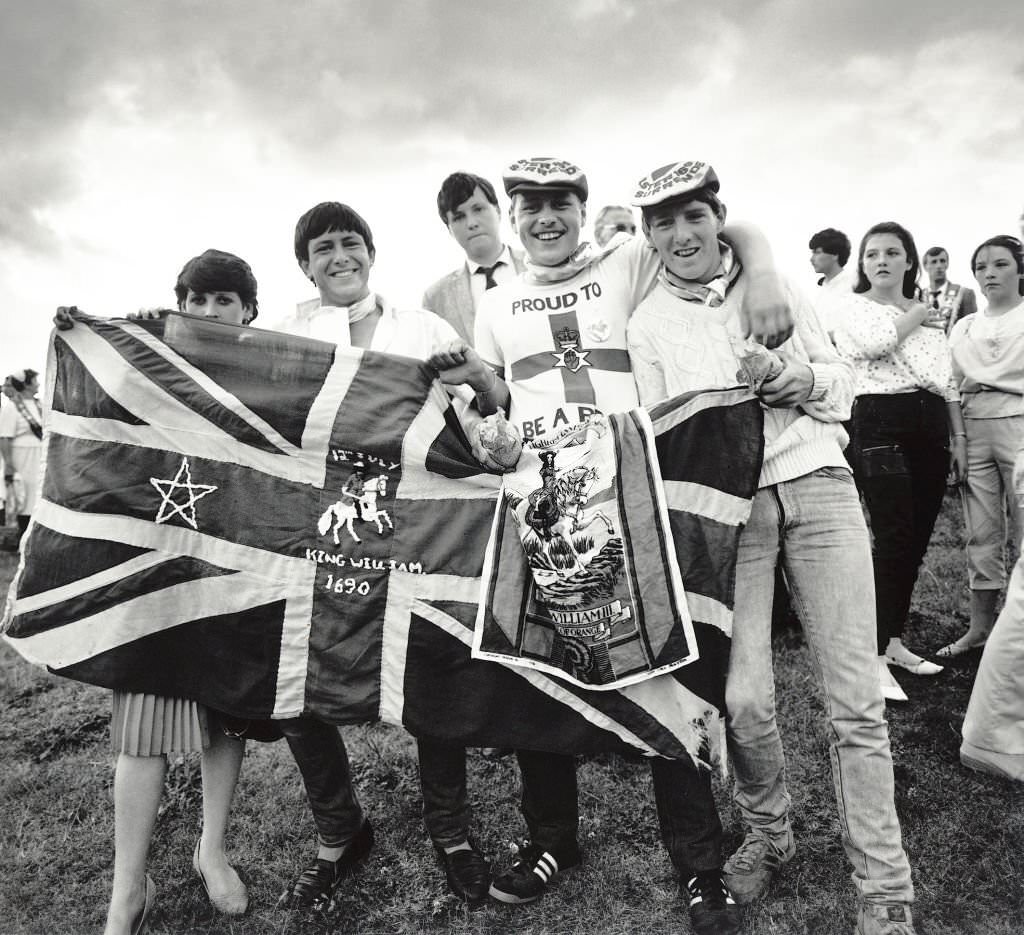 #149 Young men with their flag during the annual Orange Order march in Liverpool, July 1982.