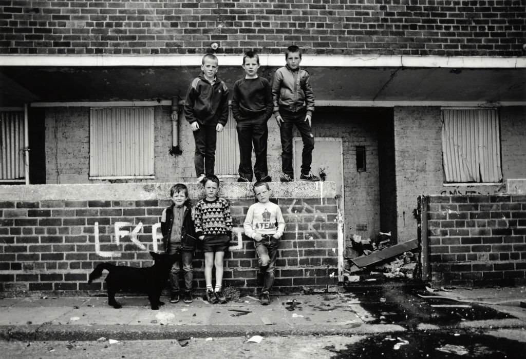 #158 A group of young boys outside a derelict building in Liverpool 1982.