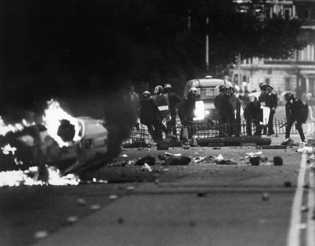 #184 Toxteth Riot 1st October 1985 Police officers attempt to remove a road block set up by rioters on Princes Road Toxteth.