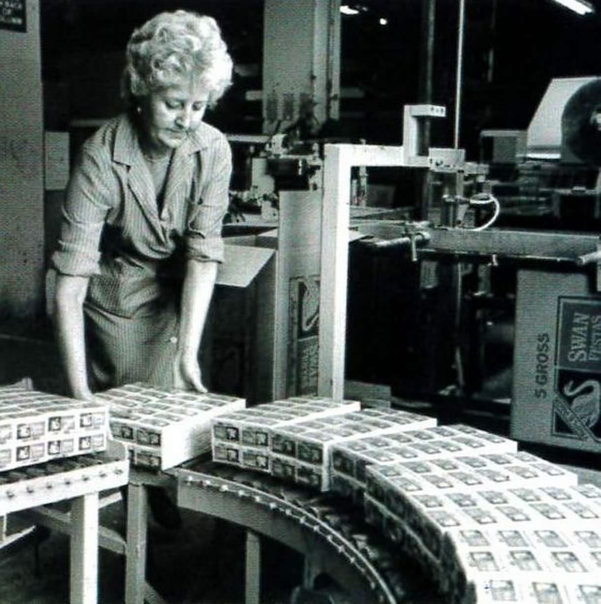#41 A match packer at work in the Bryant & May factory in Speke in 1980