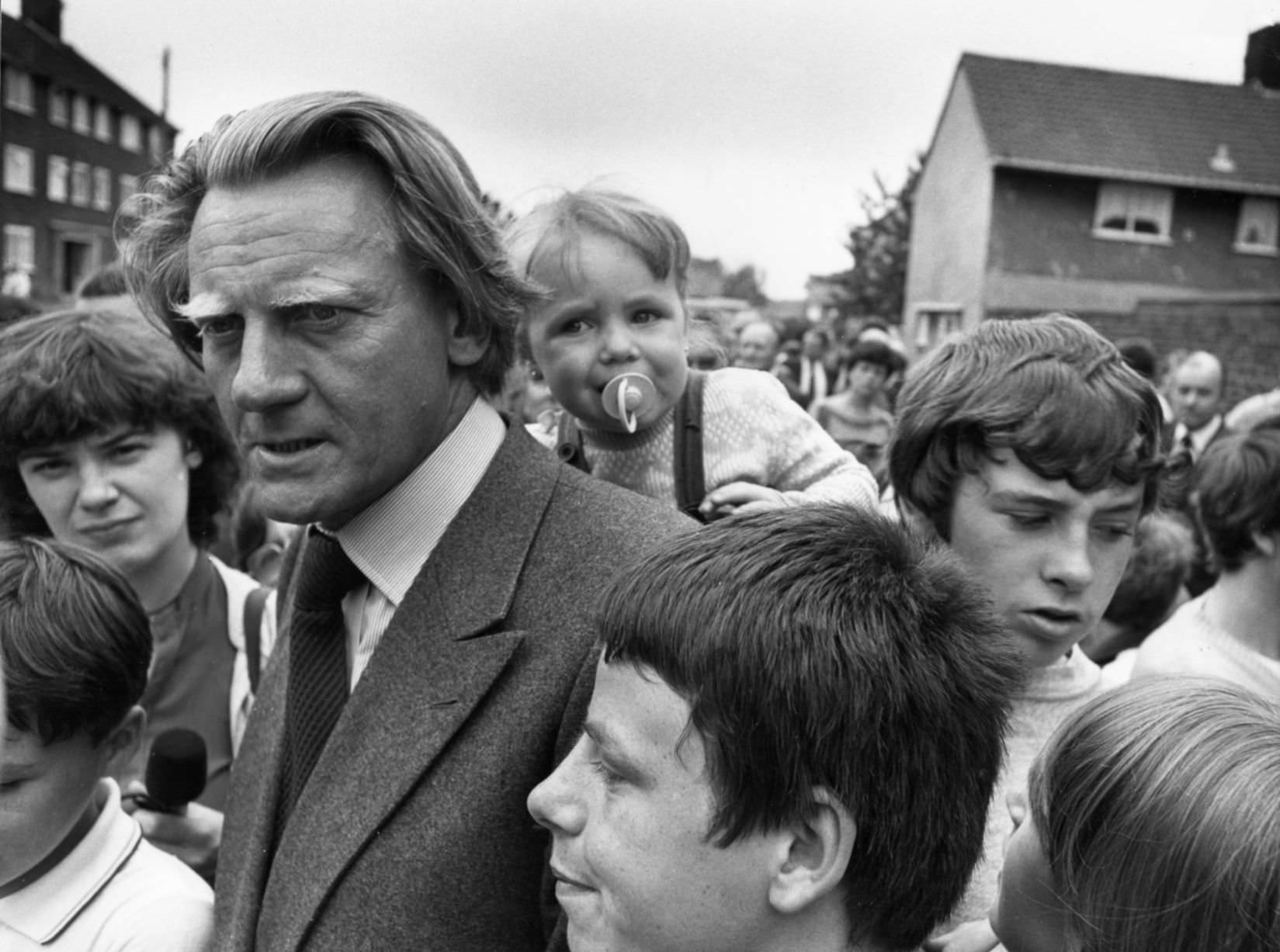 #59 Michael Heseltine Secretary of State for the Environment seen here touring Toxteth following the riots, 25th July 1981.