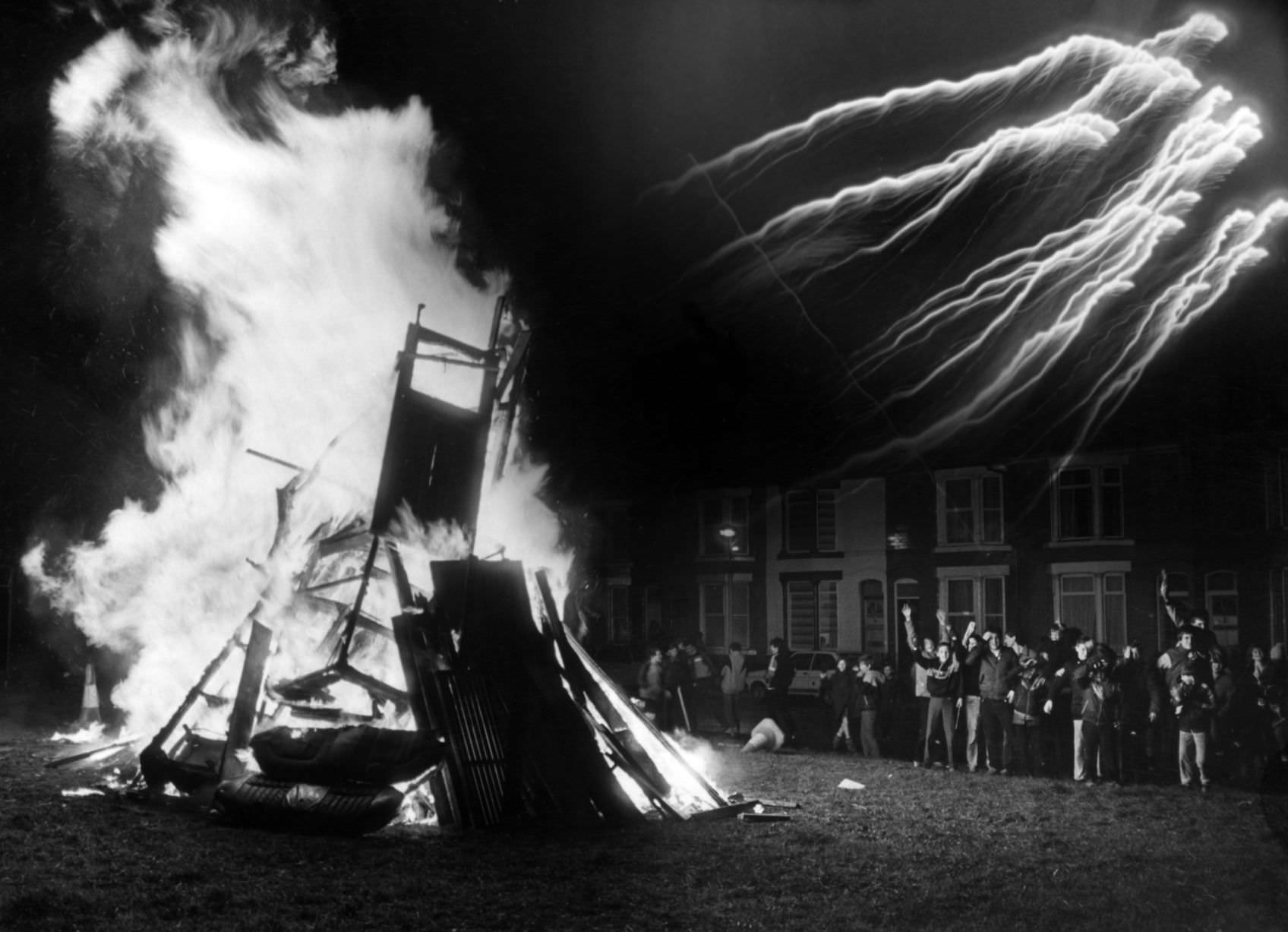#64 Youngsters enjoying Guy Fawkes Night, Hornby Boulevard, Bootle, Sefton in Merseyside, 5th November 1985