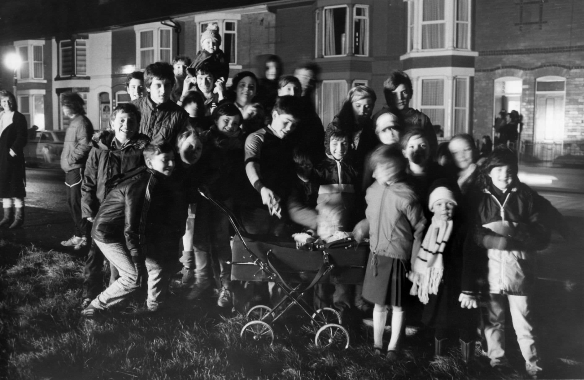 #65 Residents of Hornby Boulevard, Bootle gather to watch a private bonfire and fireworks display, 5th November 1987