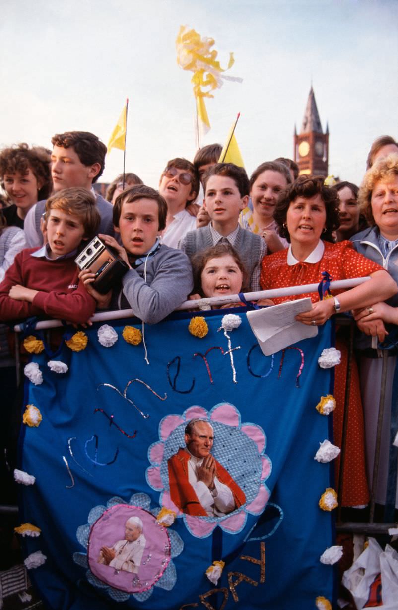 #68 Children among the crowds to welcome Pope John Paul II on his visit to Liverpool in 1982