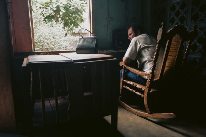 #20 La Conchita quietly tells me her son is listening to Contra-supported radio, Managua, Nicaragua, 1985