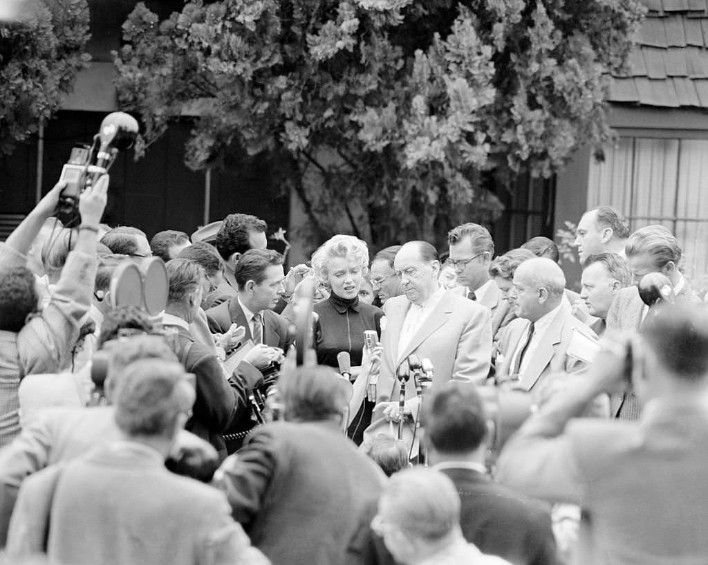 #9 Marilyn Monroe being Swamped by the Press.