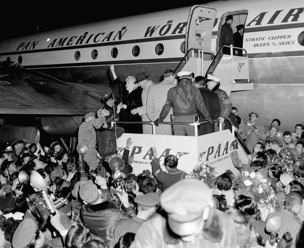 #22 Marilyn Monroe and Joe DiMaggio are seen on arrival at the Imperial Hotel.