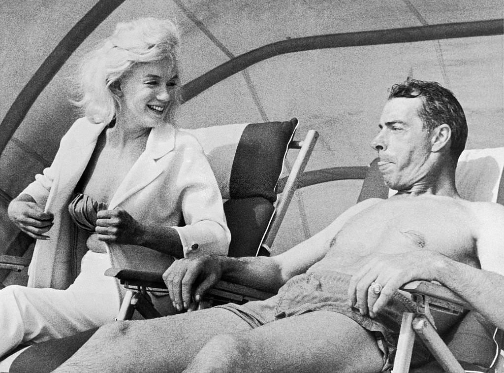 #4 Marilyn Monroe and Joe DiMaggio on the Beach. Marilyn is here for a short vacation and Joe is here as a New York Yankee spring training coach.
