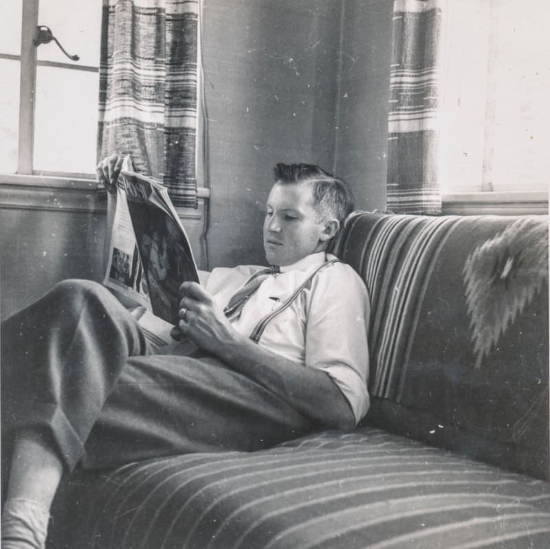 #18 Young man reading The Saturday Evening Post, circa 1940s