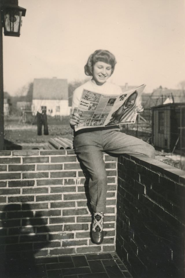 #35 Woman reading a magazine outside