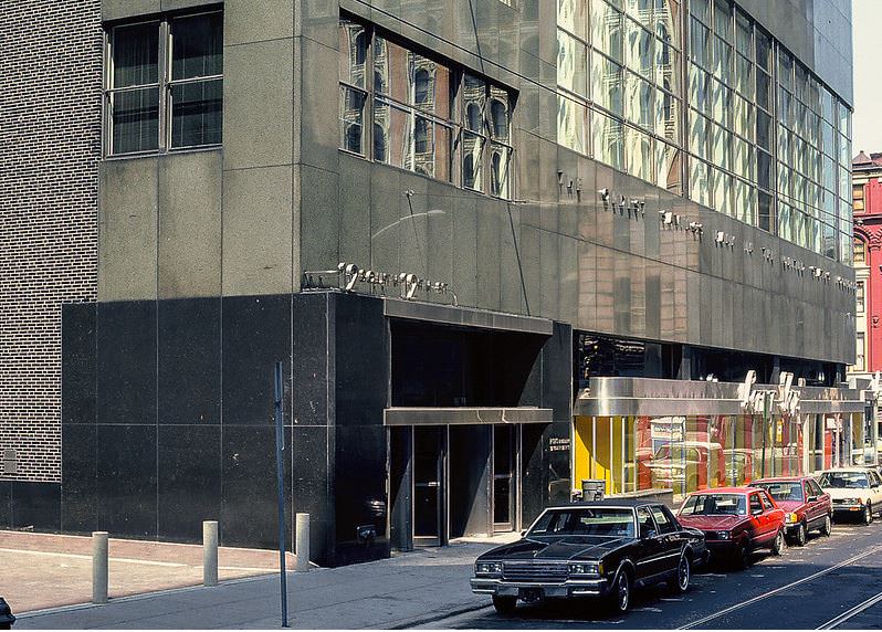 #53 Street-level view along 12th Street with the office building entrance in the foreground.